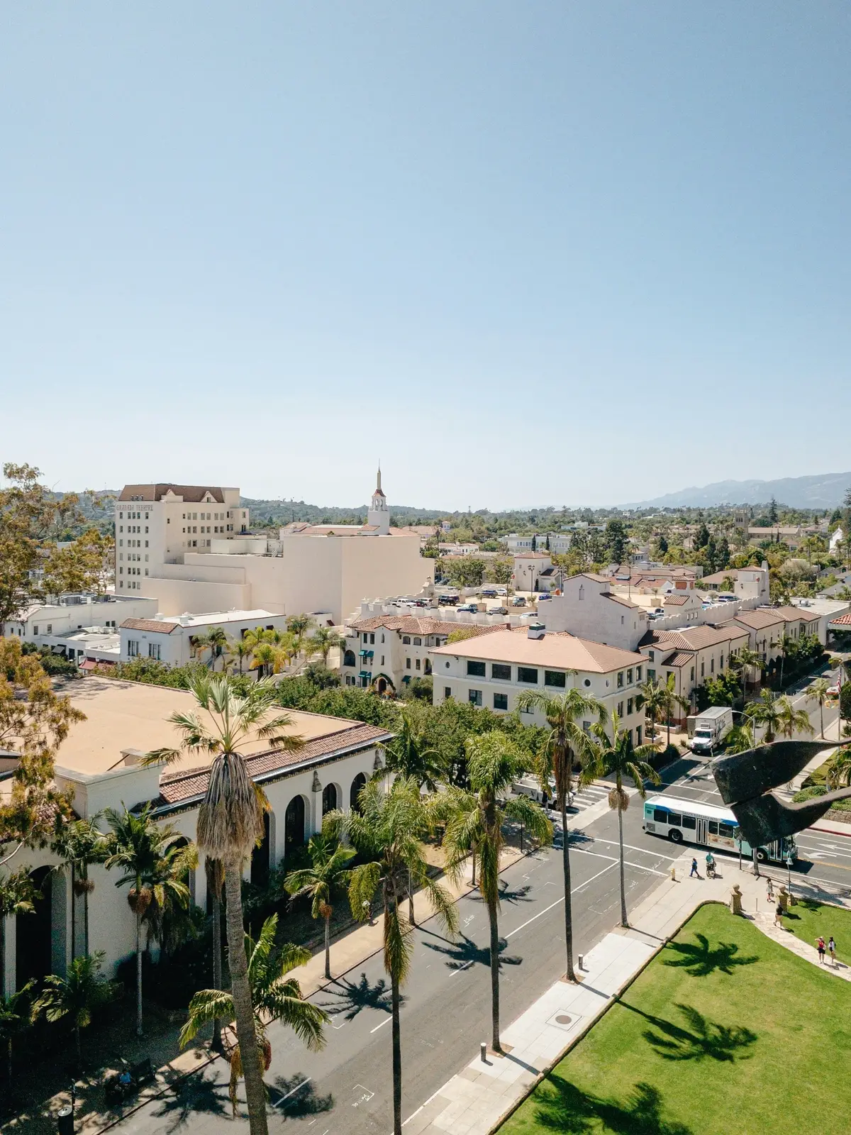 Santa Barbara mission style architecture with palm trees